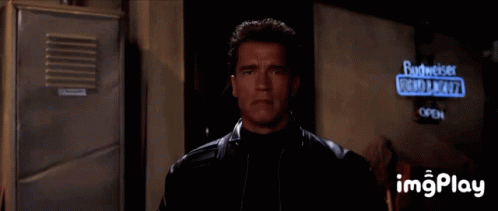 Arnold Schwarzenegger Putting On Eyeglass GIF
