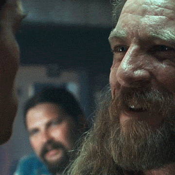 Arnold Schwarzen Blowing GIF