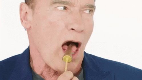 Arnold Schwarzenegger Eating Candy GIF