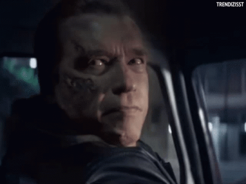 Arnold Schwarzenegger Making Funny Face in Car