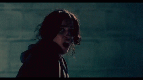 Art The Clown Scares Brunette Woman GIF