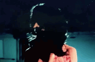 Art The Clown Wearing Lady's Skin And Hair GIF