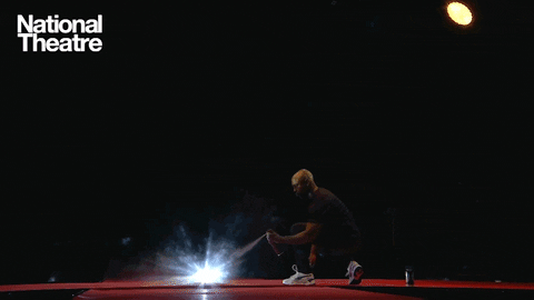 Artist Michael Balogun Spraying On Stage GIF