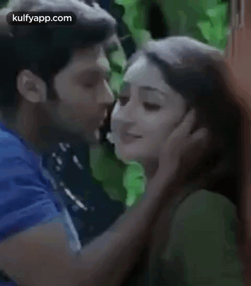 Arya And Sayyeshaa Kiss On Cheek GIF