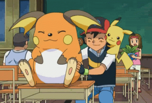 Ash And Pikachu Hugging In Classroom With Pokémon On Desk GIF