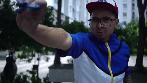 Ash Ketchum Playing Fidget Spinner GIF