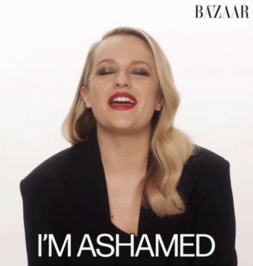 Ashamed Blonde Girl With Red Lips GIF