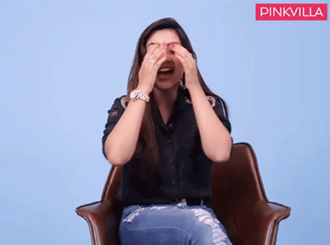 Ashamed Pretty Girl Covering Her Shy Face GIF