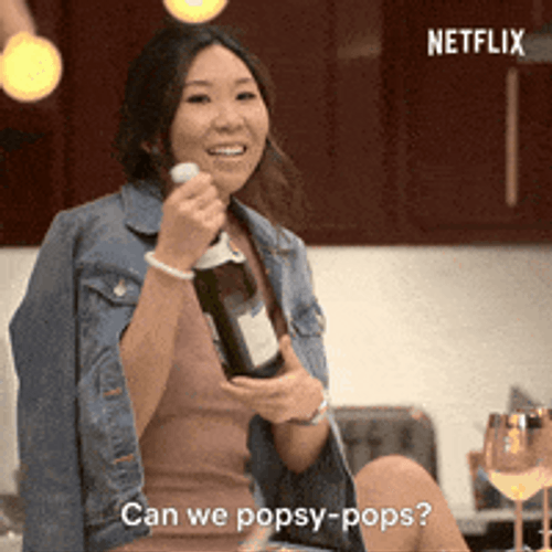 Asian Girl Champagne Popping GIF