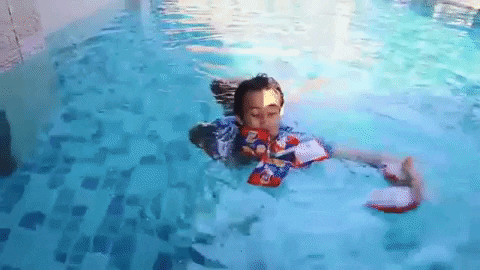 Asian Guy Drowns Grabbing Chips In Water GIF