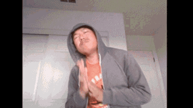Asian Guy In His Gray Jacket Birdman Hand Rub GIF