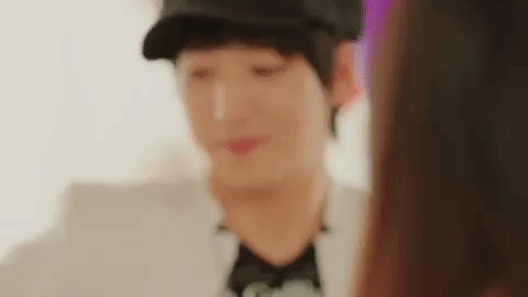 Asian Man Giving Flowers GIF