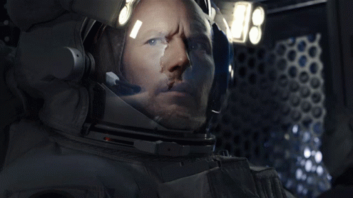 Astronaut Helmet Reflecting Moon