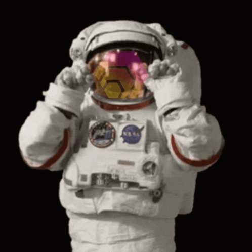 Astronaut in NASA Helmet and Gloves Covering Eyes