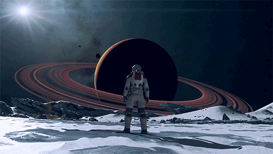 Astronaut Looking At Saturn GIF