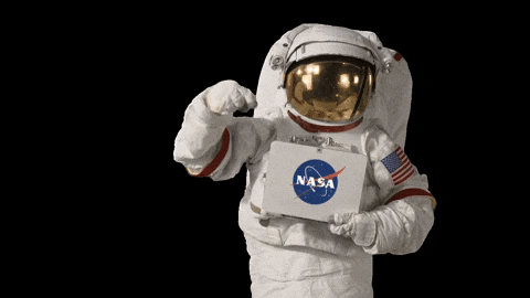 Astronaut Pointing At Nasa Sign GIF