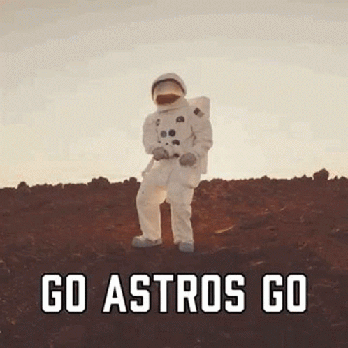 Astronaut Standing in Dirt With Go Astros Go