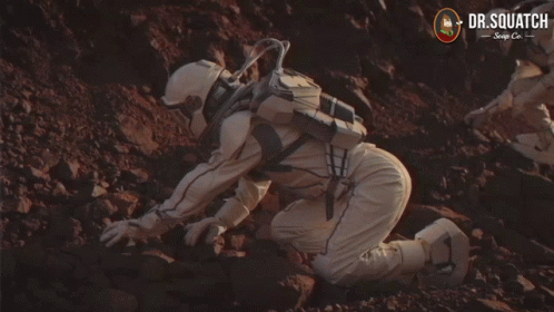Astronauts Uncovering Box On Mars GIF