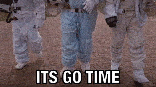 Astronauts Walking On Brick Sidewalk Saying Its Go Time GIF