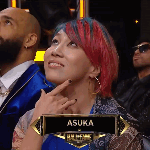 Asuka Wrestler Winking And Cheering GIF