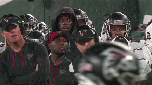 Atlanta Falcons Football Players Standing In Rain GIF