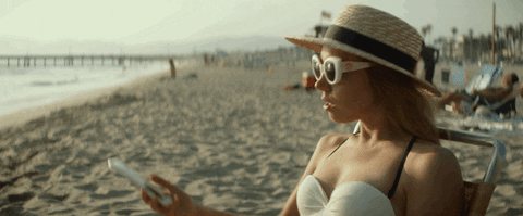 Aubrey Plaza Checking A Text GIF
