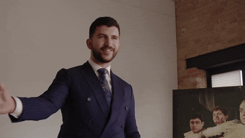 Auctioneer Persuading Wealthy Bidders GIF