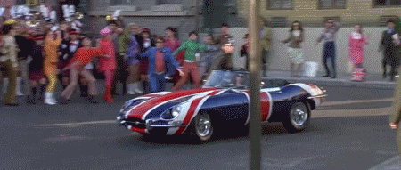 Austin Powers Jumping Into His Car GIF