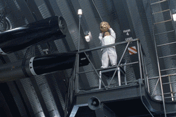 Austin Powers Mini Me Hitting Dr Evil GIF