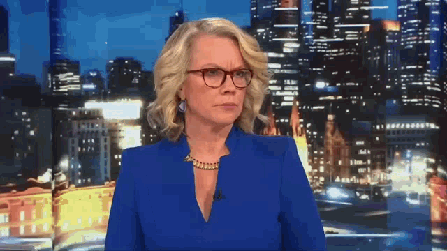Australian Journalist Laura Tingle Taking Notes GIF
