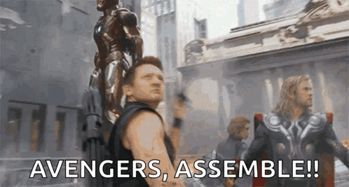 Avengers Assemble in Front of Building