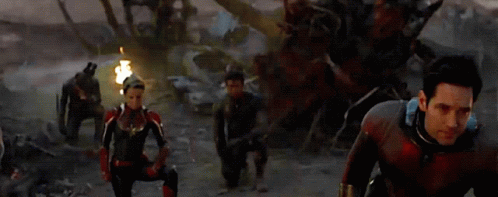 Avengers Walking Through Destroyed City