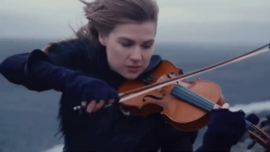 Awesome Taylor Davis Performing Worlds Smallest Violin GIF