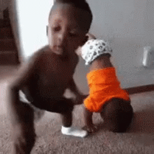Babies Doing Headstand And Celebration Dance GIF