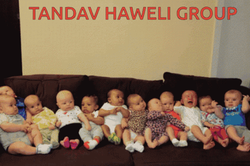 Babies Sitting on Couch Tandav Haweli Group