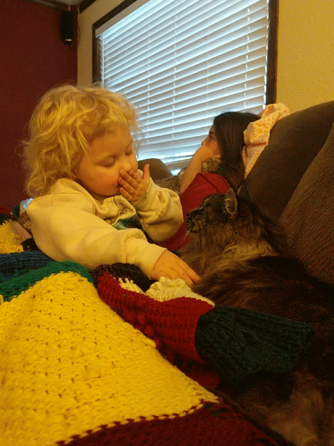 Baby Blowing Kisses To Her Cat GIF