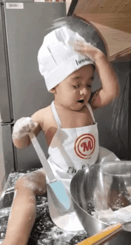 Baby Chef Holding Spatula and Bowl