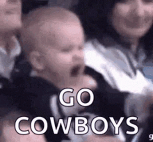 Baby Crying In Crowd Held By Woman GIF