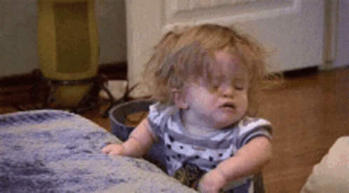 Baby Crying On Couch GIF
