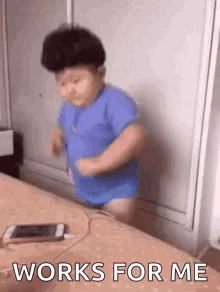 Baby Dancing With Cell Phone GIF