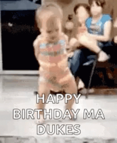 Baby Dancing With Woman Holding Baby In Background GIF