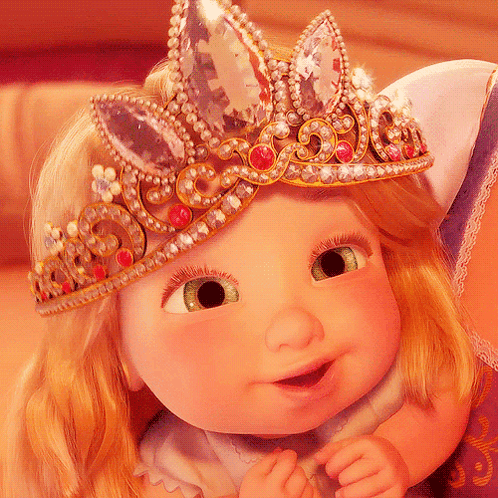 Baby Doll Wearing Tiara Smiling