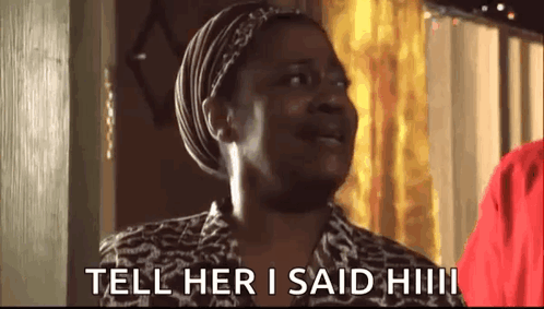 Baby Funny Face Green Shirt In Woman's Arms GIF
