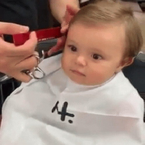 Baby Gets Haircut From Barber GIF