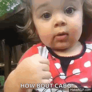 Baby Girl in Minnie Mouse Outfit Making Funny Face