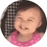 Baby Girl in Pink Dress Smiling in Circle