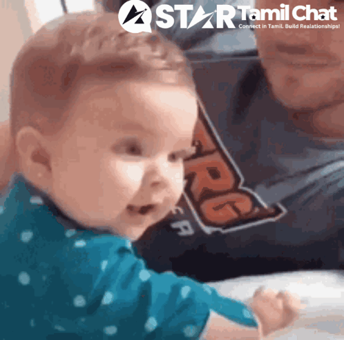 Baby Held by Man in Star Tamil Chat Ad