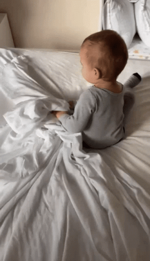 Baby Hide Under Blankets GIF