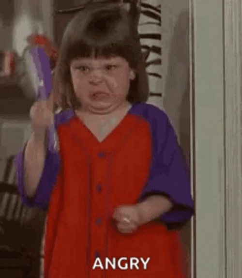 Baby Holding Combs With Anger GIF