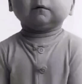 Baby In Black And White Turtleneck Sweater GIF